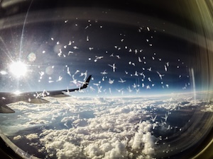 Snowflakes on the window of a jet